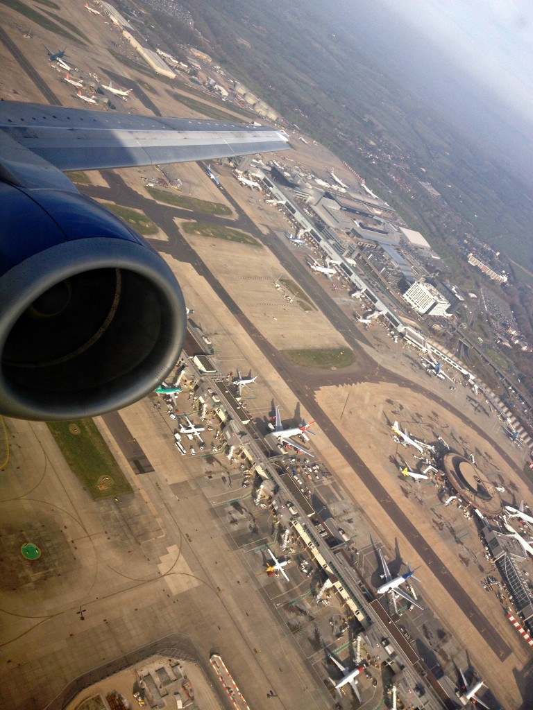 80 pairs of shoes up in the air with british airways gatwick to amsterdam aerial view of gatwick airport
