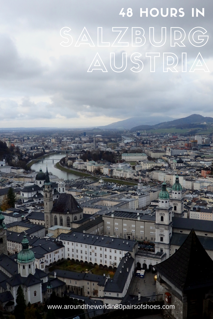Austria Travel Inspiration48 Hours in Salzburg, Austria in Winter.  This European city is a beautiful destination whichever season you decide to visit however with the Christmas Markets to explore in December and snow, it's like you are inside your own beautiful snow globe.  Pop on over to the blog to read my travel guide to Salzburg and tips including gluten free food advice. #salzburg #austria #beautifuldestinations #bucketlistideas #80pairsofshoes